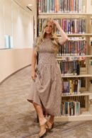 THE LANEY SMOCKED GINGHAM MIDI DRESS IN BROWN