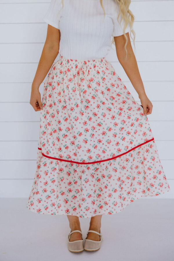 THE TAYDEN FLORAL MIDI SKIRT IN RED